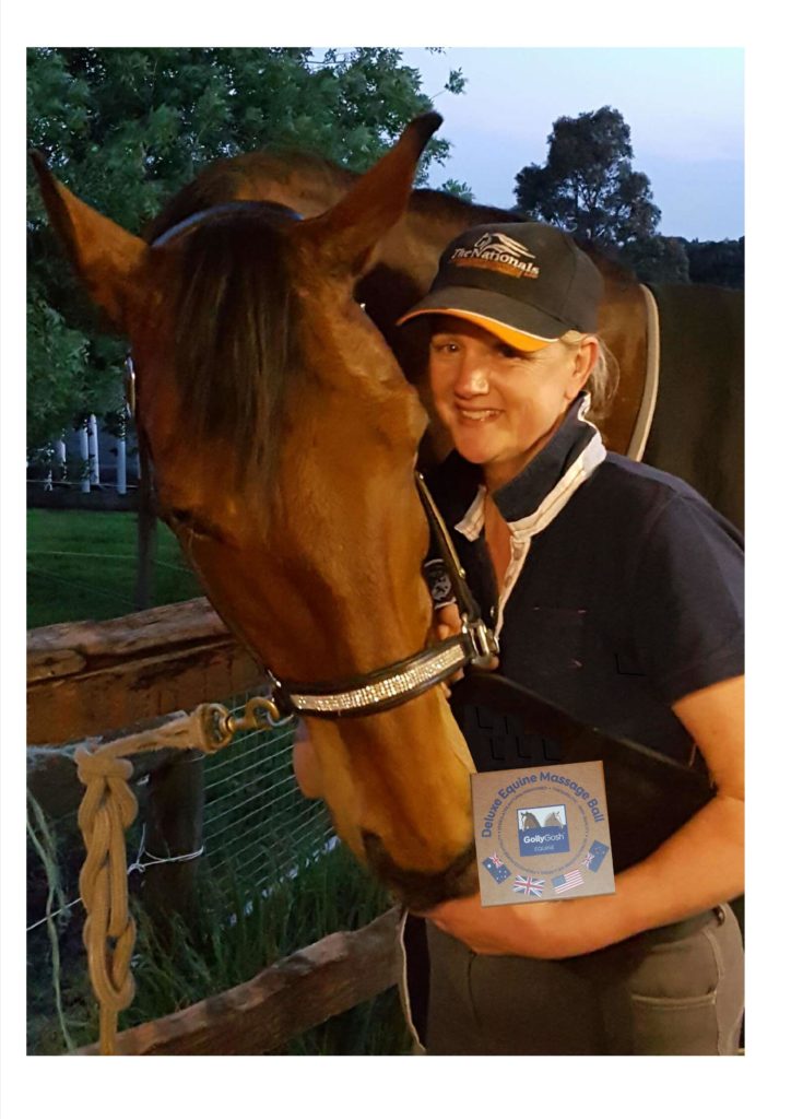 wendy bonding with horses holding deluxe horse massage tools
